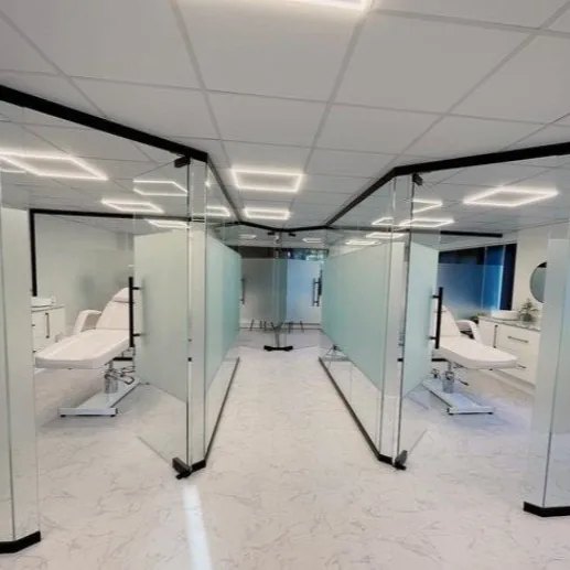 Glass-fronted aesthetic treatment rooms at BIAD's The Academy Space in Cannock